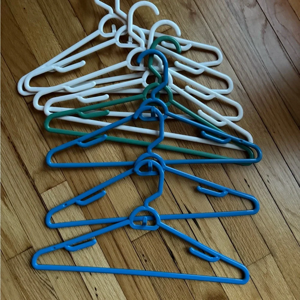 Set of Blue, Green, and White Plastic stacking Hangers